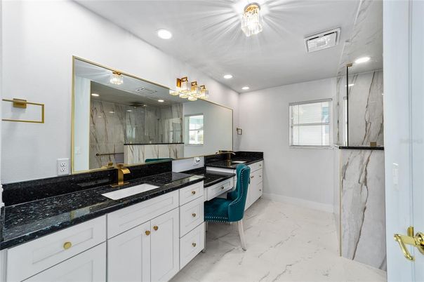 Bathroom, Dual Sink Vanities, Interior, Marble, Marble Walls, Recessed Lighting