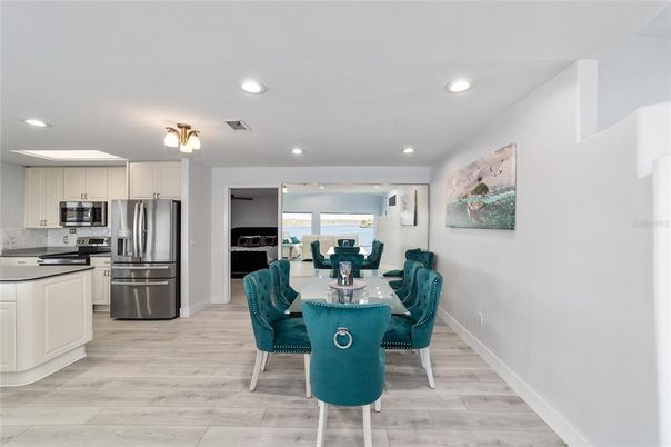 Dining room, Interior, Kitchen, Recessed Lighting, Stainless Steel Appliances, Wood Texture Flooring