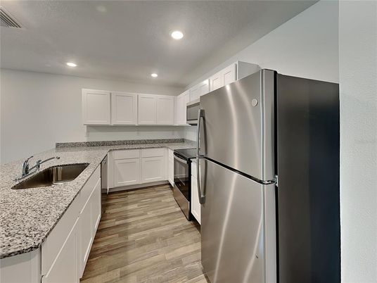 Interior, Kitchen, Recessed Lighting, Stainless Steel Appliances, Wood Texture Flooring