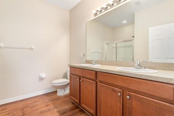 Bathroom, Dual Sink Vanities, Interior, Recessed Lighting, Wood Texture Flooring