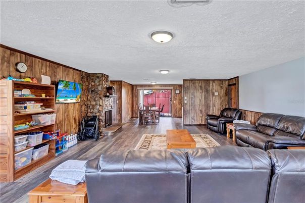 Dining room, Fireplace, Interior, Living room, Wood Texture Flooring, Wooden Walls