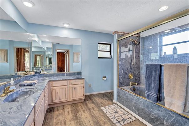 Bathroom, Dual Sink Vanities, Glass Shower, Interior, Recessed Lighting, Wood Texture Flooring
