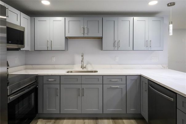 Interior, Kitchen, Pendant Lights, Recessed Lighting, Stainless Steel Appliances, Wood Texture Flooring