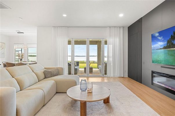 Fireplace, Interior, Living room, Pendant Lights, Recessed Lighting, Water, Wood Texture Flooring