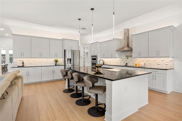Interior, Kitchen, Pendant Lights, Recessed Lighting, Stainless Steel Appliances, Wood Texture Flooring
