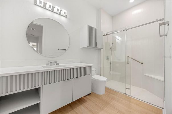Bathroom, Glass Shower, Interior, Recessed Lighting, Wood Texture Flooring