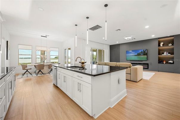 Dining room, Interior, Kitchen, Living room, Pendant Lights, Recessed Lighting, Wood Texture Flooring