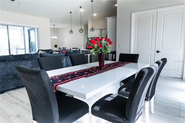 Dining room, Interior, Living room, Pendant Lights, Recessed Lighting, Wood Texture Flooring