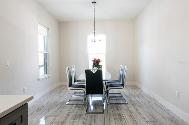 Chandelier, Dining room, Interior, Pendant Lights, Wood Texture Flooring