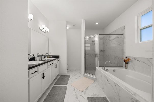 Bathroom, Dual Sink Vanities, Glass Shower, Interior, Marble, Marble Walls, Recessed Lighting