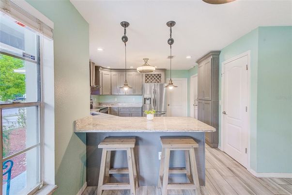Interior, Kitchen, Pendant Lights, Recessed Lighting, Stainless Steel Appliances, Wood Texture Flooring