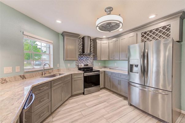 Interior, Kitchen, Recessed Lighting, Stainless Steel Appliances, Wood Texture Flooring