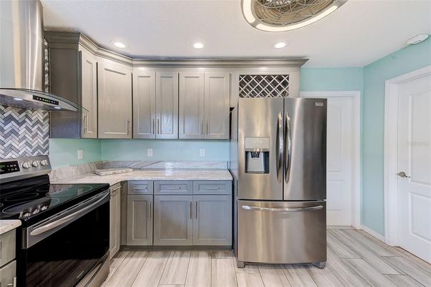 Interior, Kitchen, Recessed Lighting, Stainless Steel Appliances, Wood Texture Flooring