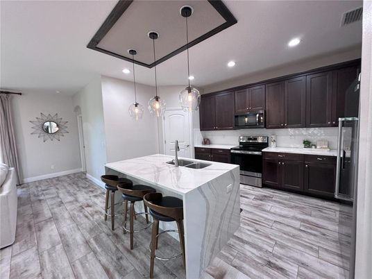 Interior, Kitchen, Pendant Lights, Recessed Lighting, Stainless Steel Appliances, Wood Texture Flooring
