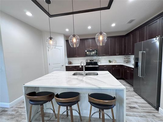 Interior, Kitchen, Pendant Lights, Recessed Lighting, Stainless Steel Appliances, Wood Texture Flooring