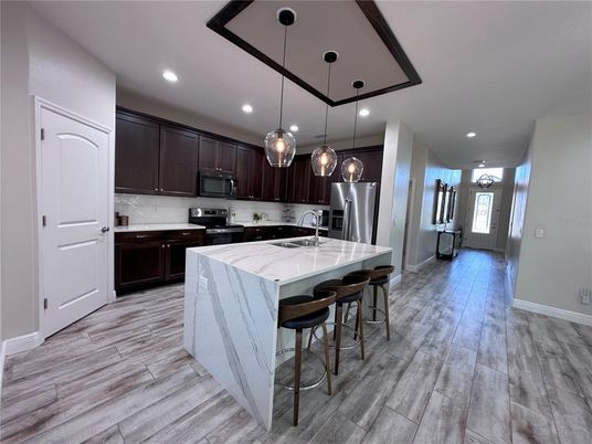 Interior, Kitchen, Pendant Lights, Recessed Lighting, Stainless Steel Appliances, Wood Texture Flooring