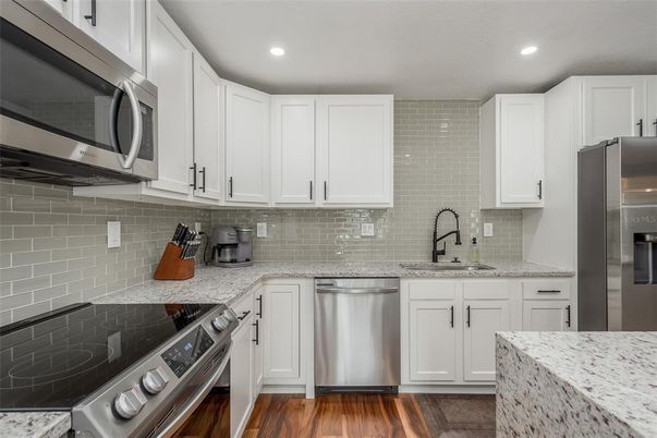 Interior, Kitchen, Recessed Lighting, Stainless Steel Appliances, Wood Texture Flooring