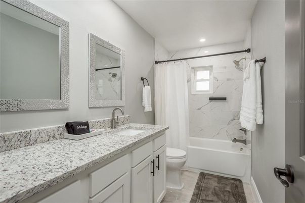 Bathroom, Dual Sink Vanities, Interior, Marble Walls, Recessed Lighting