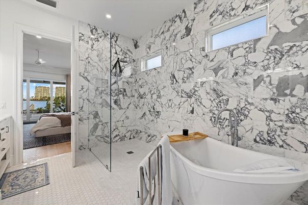 Bathroom, Bedroom, Free Standing Baths, Glass Shower, Interior, Marble Walls, Recessed Lighting