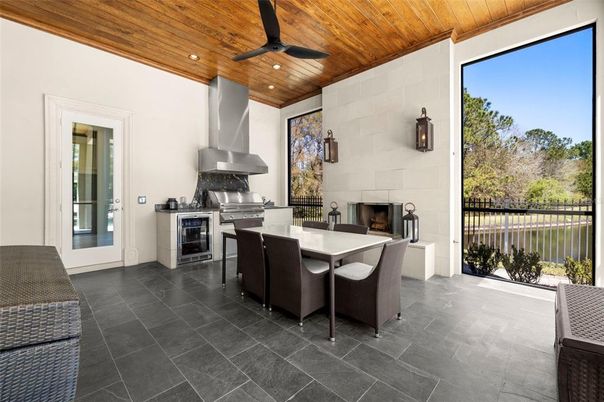 Dining room, Fireplace, Interior, Kitchen, Recessed Lighting, Stone Walls, Wooden Ceilings