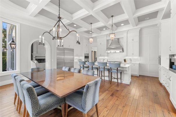 Chandelier, Dining room, Interior, Kitchen, Pendant Lights, Recessed Lighting, Stainless Steel Appliances, Wood Texture Flooring