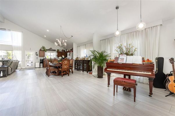 Dining room, Interior, Pendant Lights, Piano, Recessed Lighting, Wood Texture Flooring