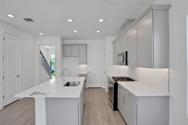Interior, Kitchen, Recessed Lighting, Stainless Steel Appliances, Wood Texture Flooring