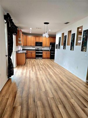 Interior, Kitchen, Pendant Lights, Recessed Lighting, Stainless Steel Appliances, Wood Texture Flooring