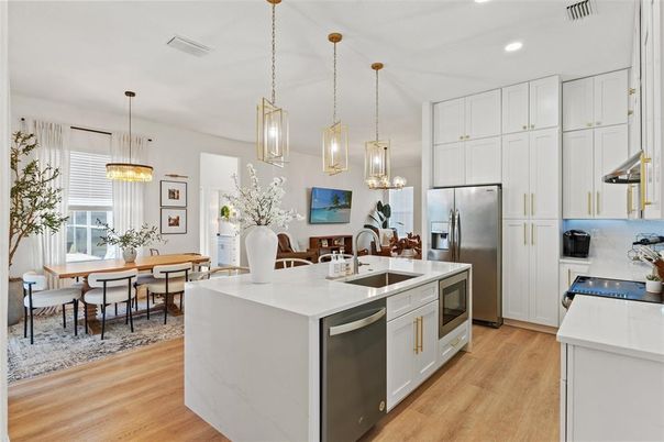 Dining room, Interior, Kitchen, Pendant Lights, Recessed Lighting, Stainless Steel Appliances, Wood Texture Flooring