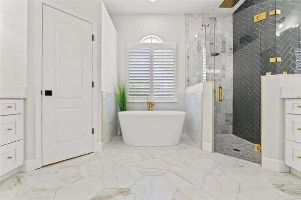 Bathroom, Free Standing Baths, Glass Shower, Interior, Marble, Marble Walls, Recessed Lighting