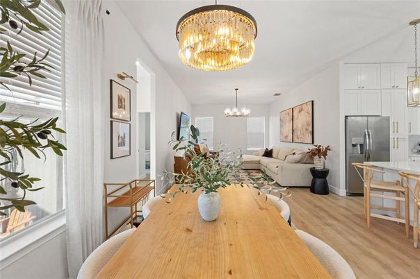 Chandelier, Dining room, Interior, Kitchen, Living room, Pendant Lights, Stainless Steel Appliances, Wood Texture Flooring