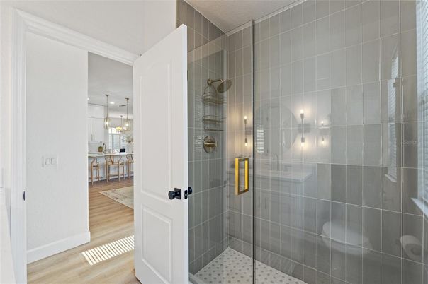 Bathroom, Chandelier, Glass Shower, Interior, Pendant Lights, Wood Texture Flooring