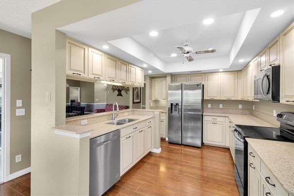 Interior, Kitchen, Recessed Lighting, Stainless Steel Appliances, Wood Texture Flooring