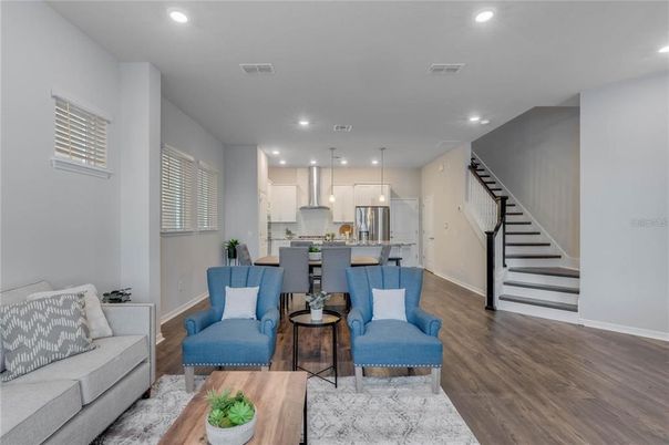 Dining room, Interior, Kitchen, Living room, Pendant Lights, Recessed Lighting, Stainless Steel Appliances, Wood Texture Flooring