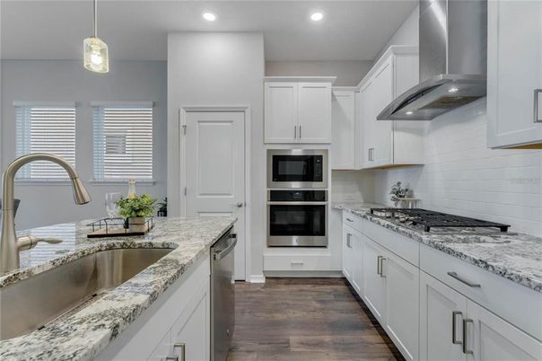 Interior, Kitchen, Pendant Lights, Recessed Lighting, Stainless Steel Appliances, Wood Texture Flooring