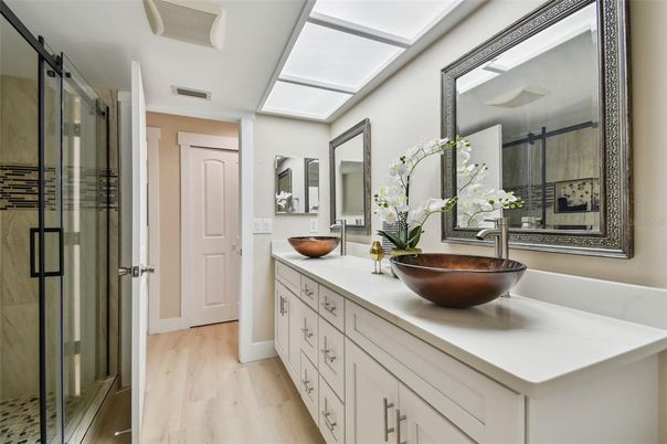 Bathroom, Dual Sink Vanities, Glass Shower, Interior, Wood Texture Flooring