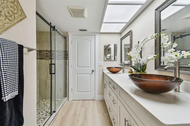 Bathroom, Dual Sink Vanities, Glass Shower, Interior, Wood Texture Flooring