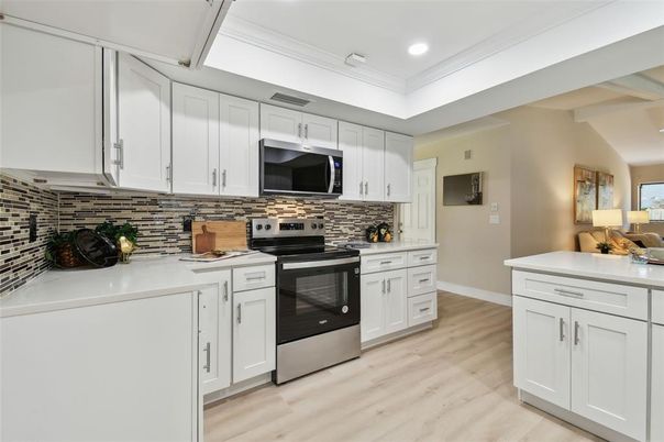 Interior, Kitchen, Recessed Lighting, Stainless Steel Appliances, Wood Texture Flooring