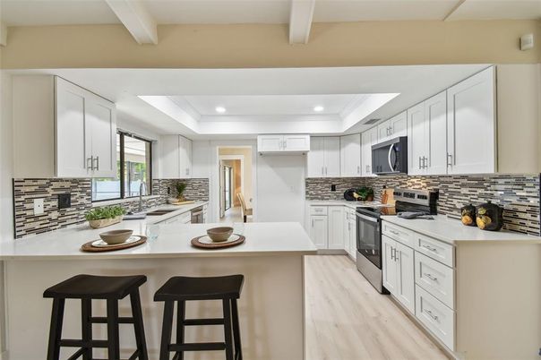 Interior, Kitchen, Recessed Lighting, Stainless Steel Appliances, Wood Texture Flooring