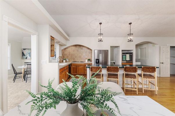 Dining room, Interior, Kitchen, Pendant Lights, Stainless Steel Appliances, Wood Texture Flooring