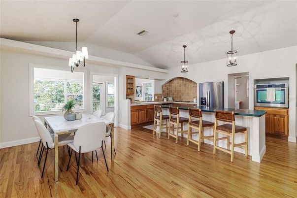 Dining room, Interior, Kitchen, Pendant Lights, Stainless Steel Appliances, Wood Texture Flooring
