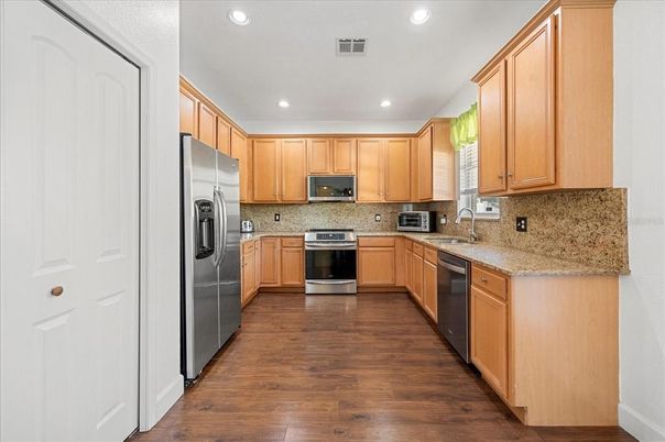 Interior, Kitchen, Recessed Lighting, Stainless Steel Appliances, Washer, Wood Texture Flooring