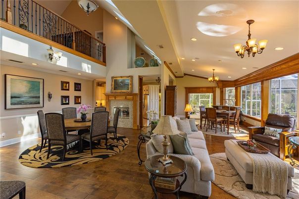 Chandelier, Dining room, Fireplace, Interior, Living room, Recessed Lighting, Wood Texture Flooring