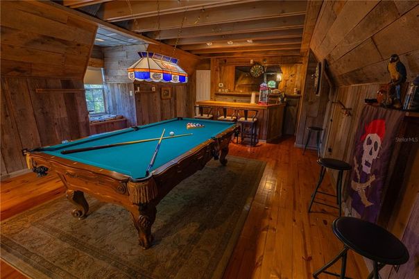 Billiard Table, Game Room, Interior, Pendant Lights, Recessed Lighting, Wood Texture Flooring, Wooden Walls
