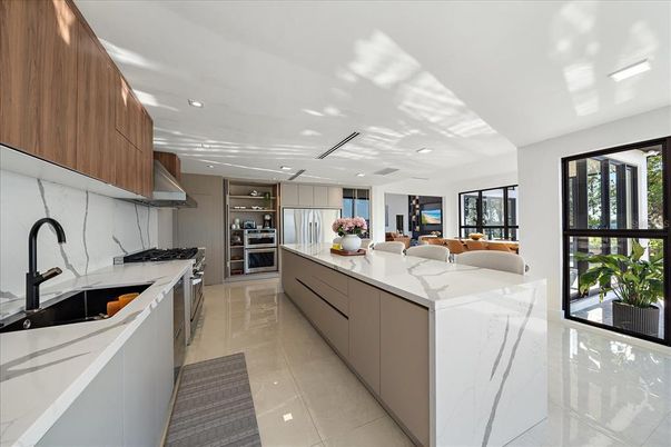 Interior, Kitchen, Marble Walls, Recessed Lighting, Stainless Steel Appliances