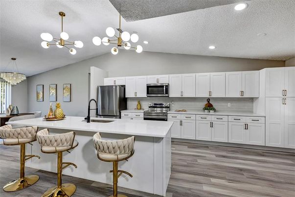 Interior, Kitchen, Pendant Lights, Recessed Lighting, Stainless Steel Appliances, Wood Texture Flooring