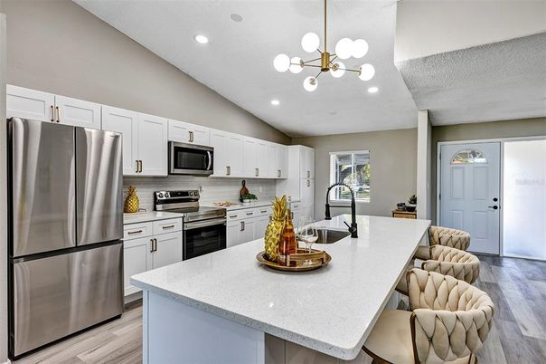 Interior, Kitchen, Pendant Lights, Recessed Lighting, Stainless Steel Appliances, Wood Texture Flooring