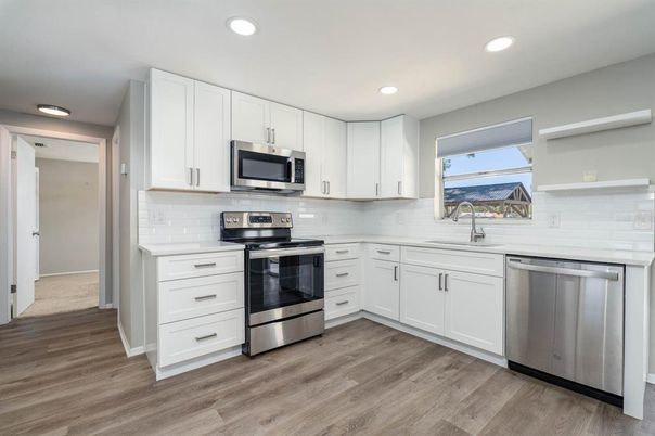 Interior, Kitchen, Recessed Lighting, Stainless Steel Appliances, Wood Texture Flooring