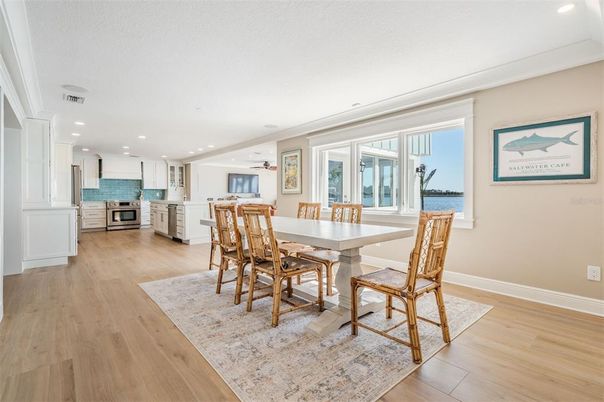 Dining room, Interior, Kitchen, Recessed Lighting, Stainless Steel Appliances, Wood Texture Flooring