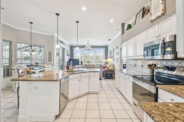Chandelier, Dining room, Interior, Kitchen, Pendant Lights, Recessed Lighting, Stainless Steel Appliances